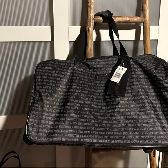 Steve Madden Handbags - Steve Madden carry all bag with rollers NWT